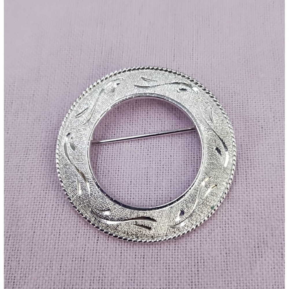 Vintage Signed CORO Round Silver Tone Embossed Brooch Wreath Scroll Etched